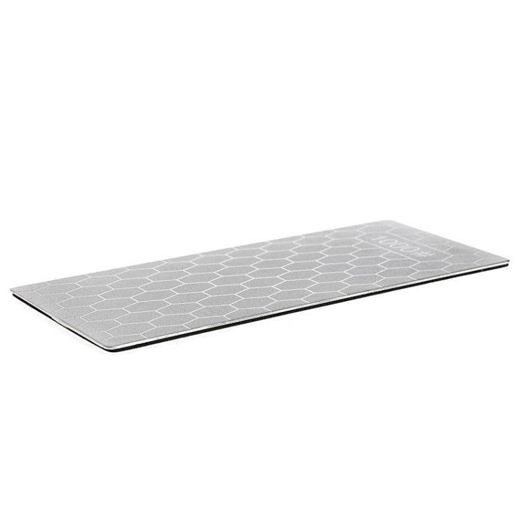 Rectangular whetstone sharpener stone with gray honeycomb pattern and thin edge