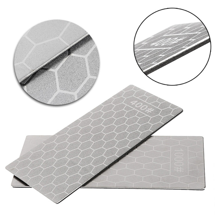 Gray sharpening stone plates showing 400# and 1000# grit markings