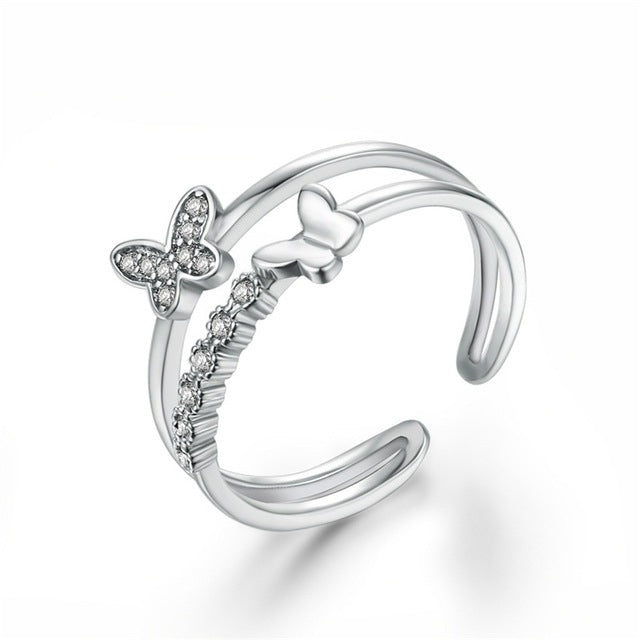 Platinum butterfly diamond opening ring, curved double-banded design with sparkling stones