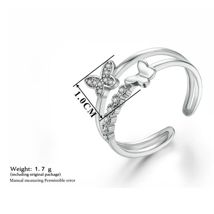 Platinum butterfly open ring with pave butterfly and textured leaf detail