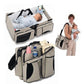 Beige and black portable baby travel foldable bed bag with built-in infant bed and side storage