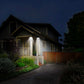 Outdoor porch pathway solar lights installed on front walkway, glowing LED lamps