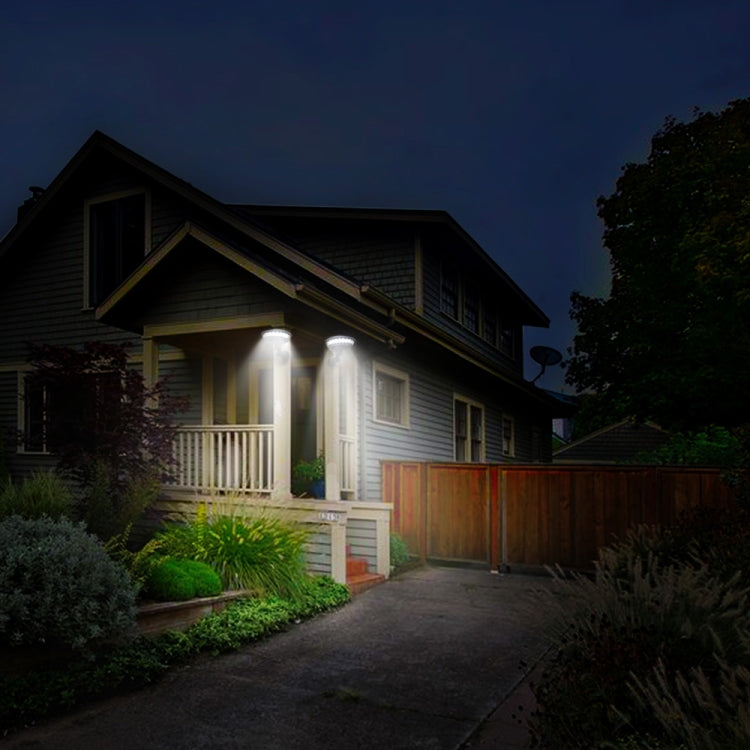 Outdoor porch pathway solar lights installed on front walkway, glowing LED lamps