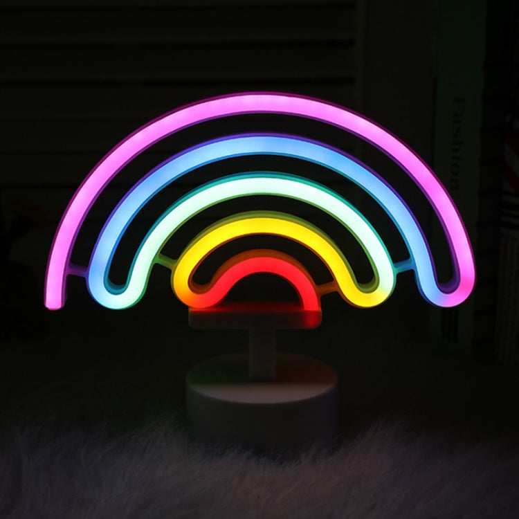Rainbow neon night light with multicolor glowing rainbow arc and round base