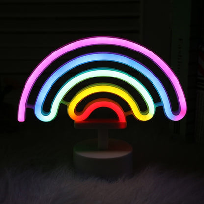 Rainbow neon night light with multicolor glowing rainbow arc and round base
