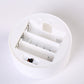 Rainbow neon light battery compartment with spring contacts inside white round housing