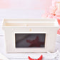 White magnetic storage box with chalkboard front panel and hanging slot