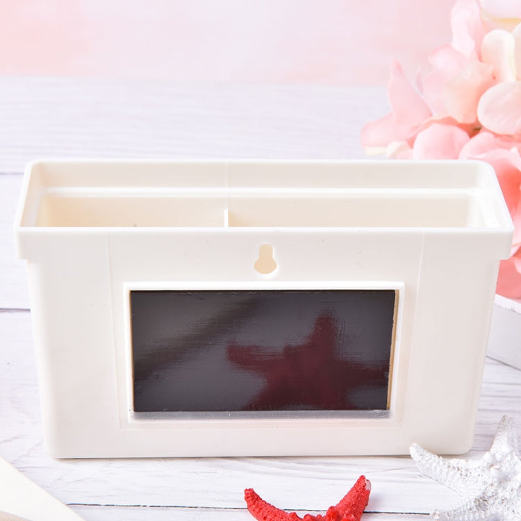 White magnetic storage box with chalkboard front panel and hanging slot