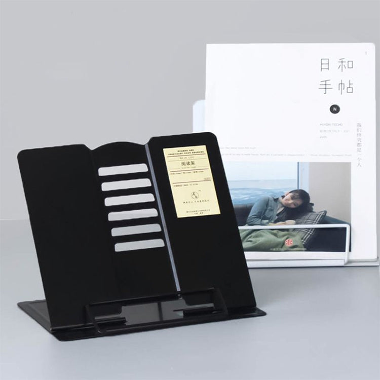 Black metal adjustable reading book stand holding a document page upright