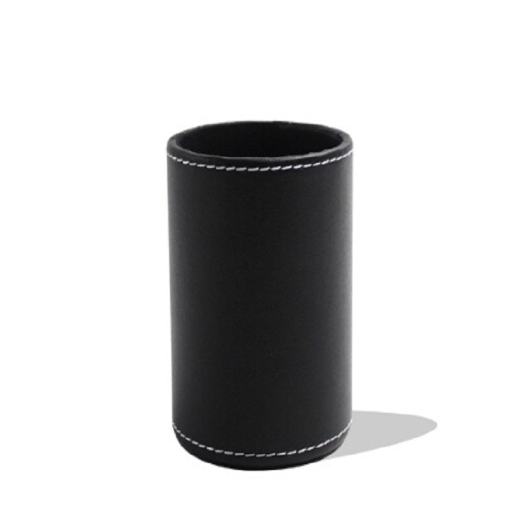 Black faux-leather pen holder organizer, upright round cylinder with stitched edge.