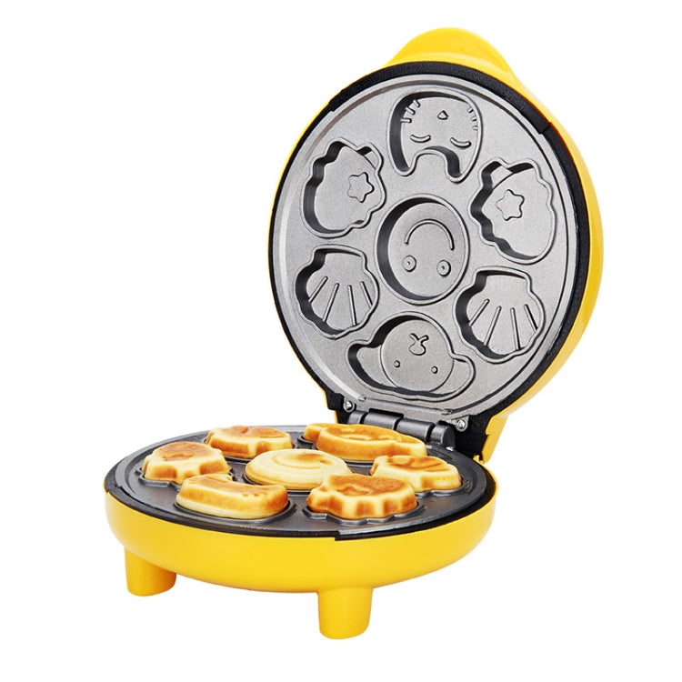 Mini double-sided cake/bread maker, yellow base and lid open, shaped cavities on plates