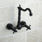 Wall-mounted bathroom faucet in black antique finish with two wall plates and side control knobs