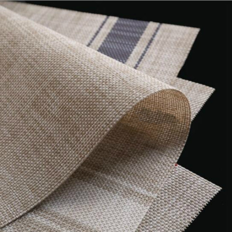 Braided PVC table mat corner detail in beige with navy stripe panel