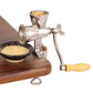 Stainless steel manual grinding mill with wooden crank handle and catch tray
