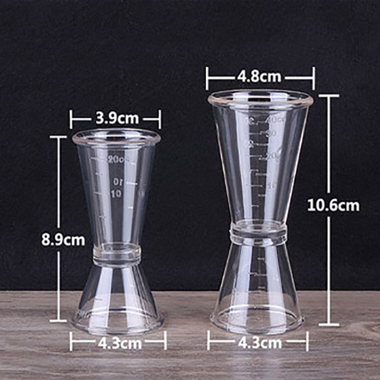 Large double-headed measuring cup size diagram, clear plastic with labeled dimensions