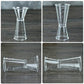 Large double-headed graduated measuring cup, clear plastic shown from different angles