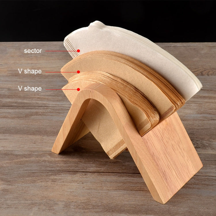 Wooden V-shaped filter holder with white paper filters; side angle view