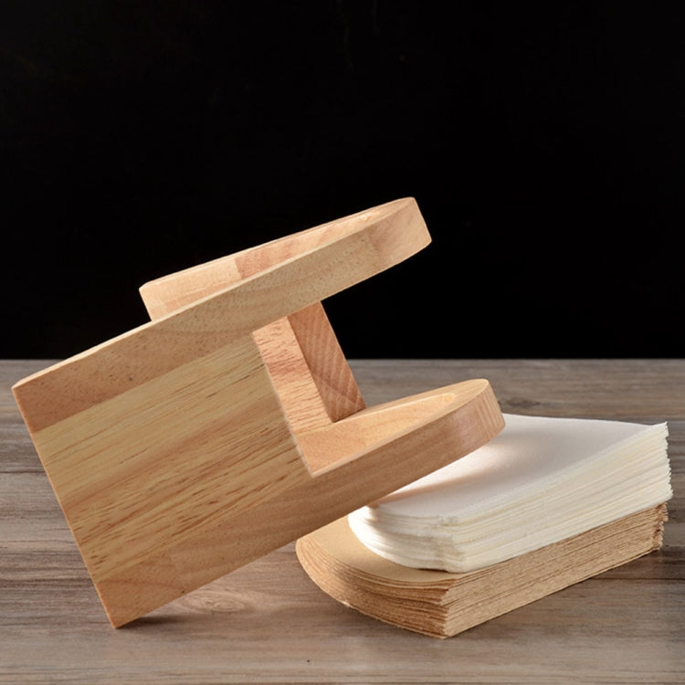 Wooden V-shaped coffee filter holder with stacked paper filters