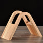 Wooden V-shaped coffee filter holder, angled view of open frame