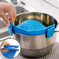 Blue silicone strainer clip on a stainless steel pot, perforated insert for draining