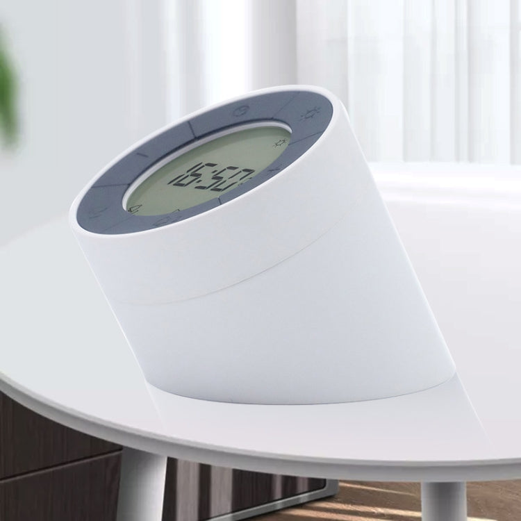 White alarm clock night light on a side table with circular LCD time display.