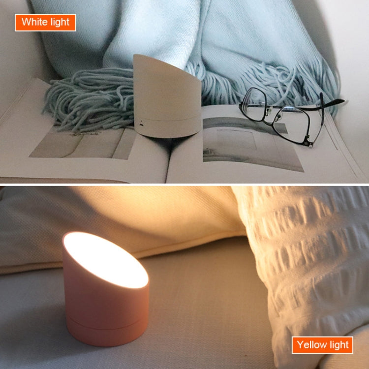 Pink night light alarm clock with glowing top lamp