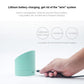 Mint alarm clock night light with round LCD display and charging cable connection.