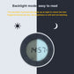 Close-up of gray alarm clock night light LCD showing time with surrounding control icons.