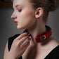 Red neck massager collar with side control panel for neck physiotherapy