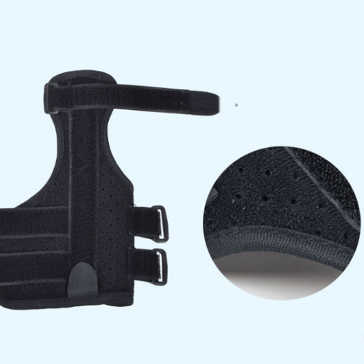 Black wrist brace with thumb cover and buckle straps, close-up of strap details