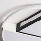 Ceiling lamp detail: white circular frame with black center strip and light panel