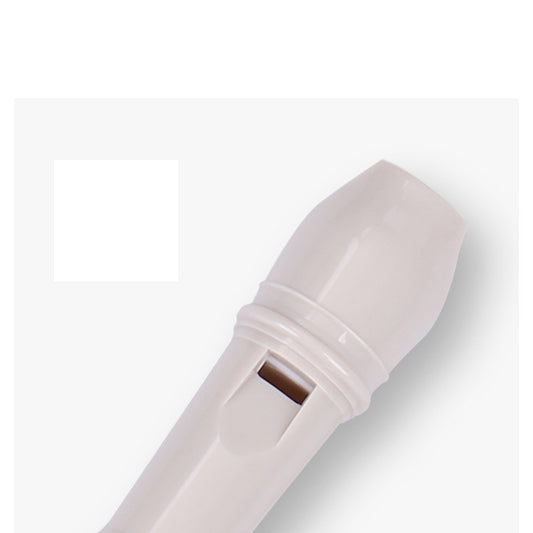 White plastic 8-hole clarinet-style flute mouthpiece close-up