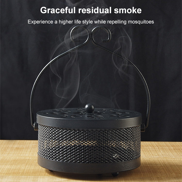 Black mosquito coil box with domed vented lid and arched handle on tabletop