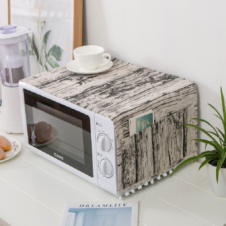 Microwave oven dust cover with gray-white distressed print and pom trim edge