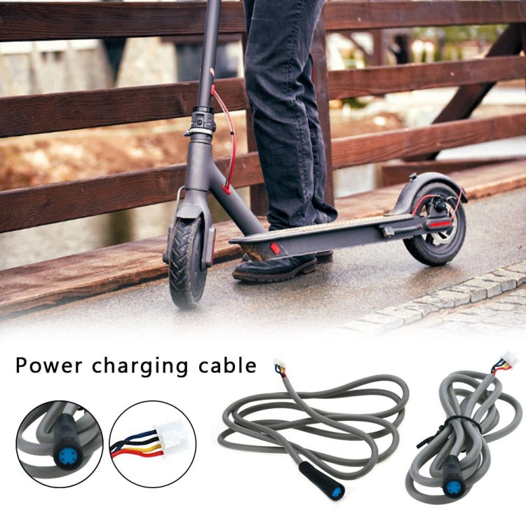 Electric scooter charging cable with blue connector and multicolor wire plug
