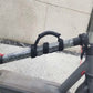 Black handle strap with padded grip on electric scooter handlebar