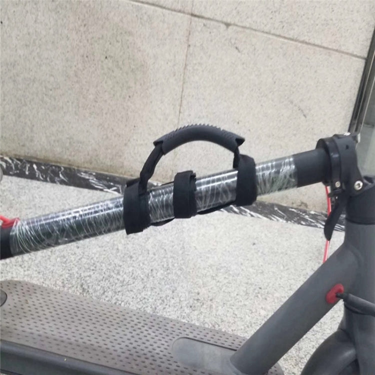 Black handle strap with padded grip on electric scooter handlebar