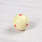 Cream training billiard ball with three red dot spots and glossy finish