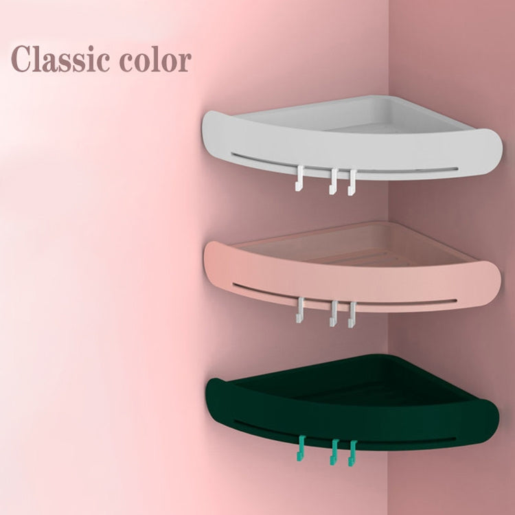 Wall-mounted triangular plastic storage baskets in classic colors, each with three hooks