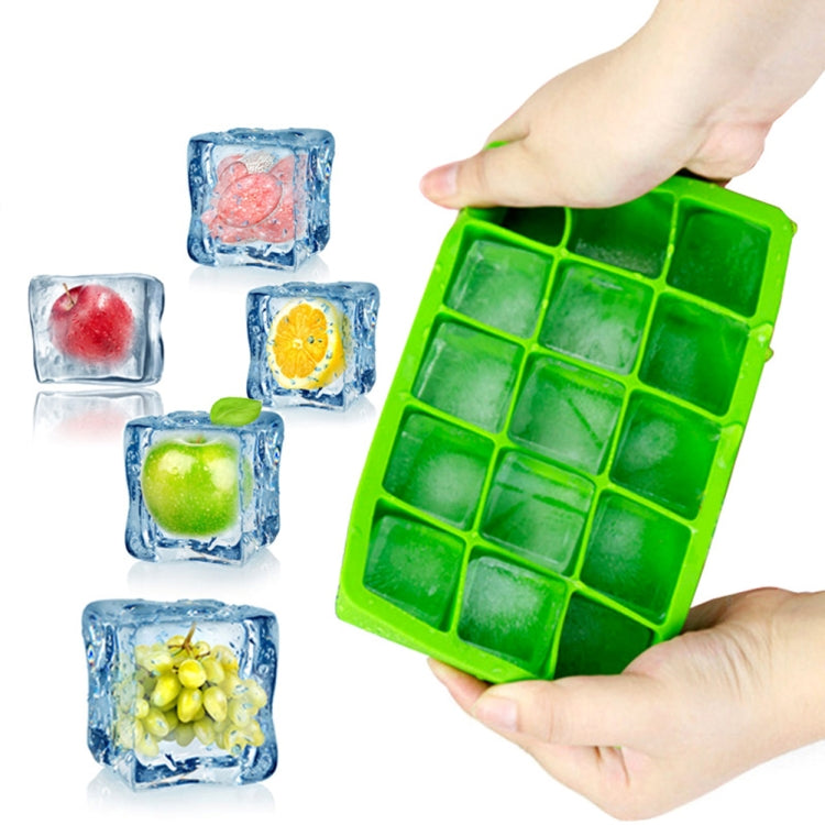 Green 15-grid silicone ice tray holding square fruit ice cubes