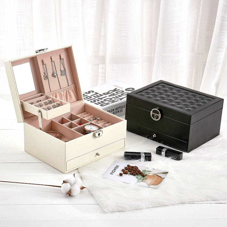 White and black jewelry storage boxes, open white organizer with multiple earring slots