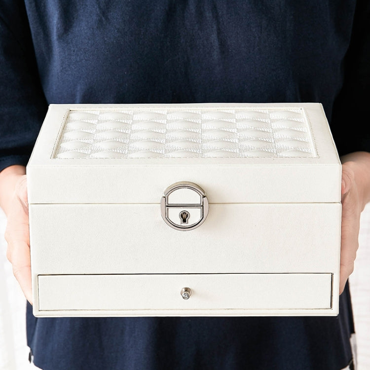 White jewelry storage box with quilted top insert and front lock clasp