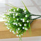 White simulation flower bouquet with small clustered starry blossoms and green stems