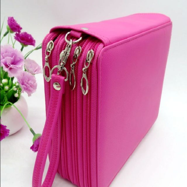 Rose red PU leather pencil case with double zippers and keychain-style pulls