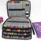 Black PU leather pencil case, open with rows of colored pencils in slots
