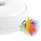 White cat toy with rainbow faux-fur brush attached near a side opening