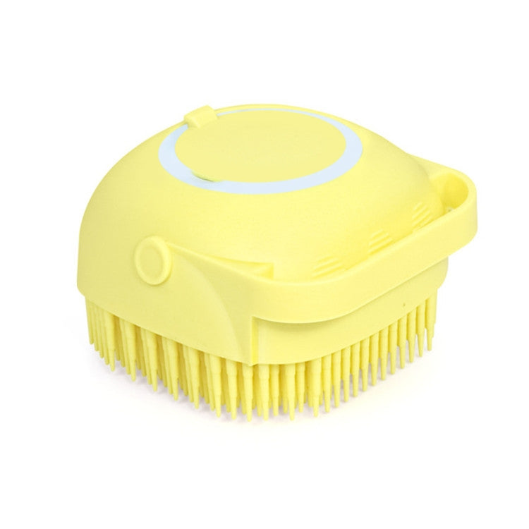 Yellow pet bath brush head with silicone bristles and circular gel lid