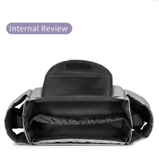 Open gray baby diaper bag with dark lining and wide top organizer compartments