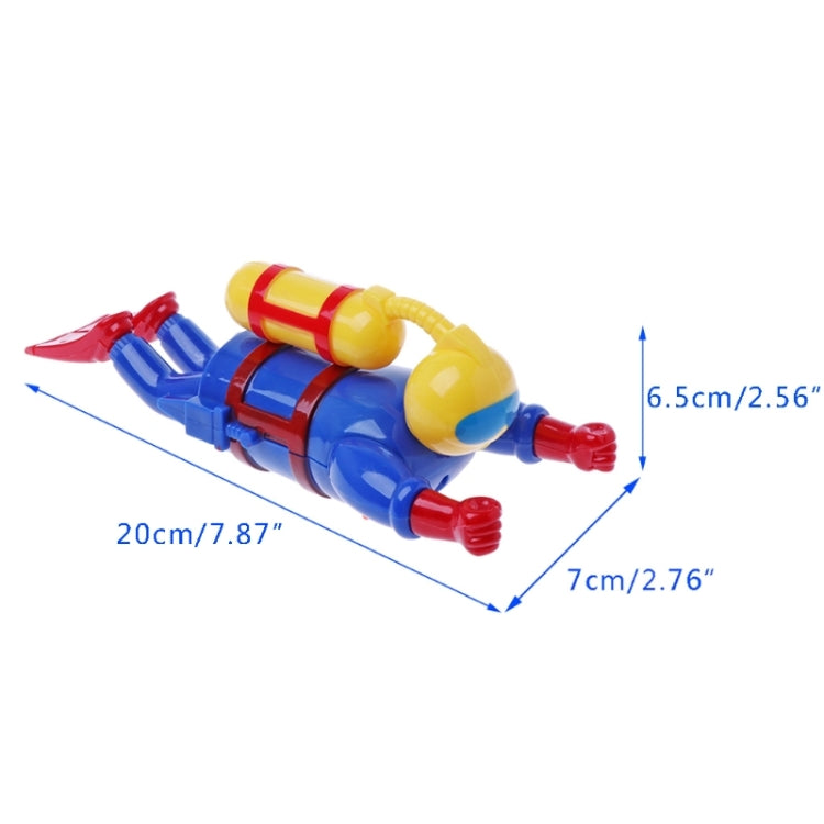Blue clockwork diver toy with yellow helmet, red fins, and red crossbody strap