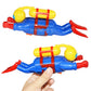 Clockwork diver toy set: blue body, yellow helmet, red arms and fins; one in hand